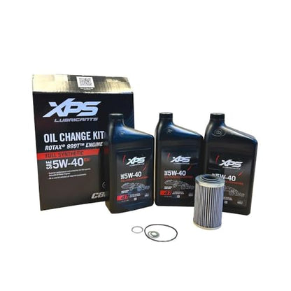 A Can Am Maverick R Oil Change Kit 5W40 Full Synthetic, including two bottles of oil and an oil filter, with the product packaging visible. Maverick R