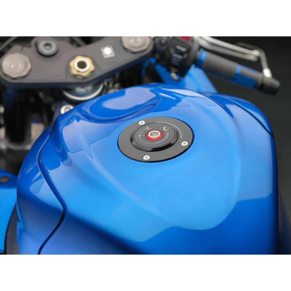 
                      
                        Gas Cap Locking Black Suz
                      
                    