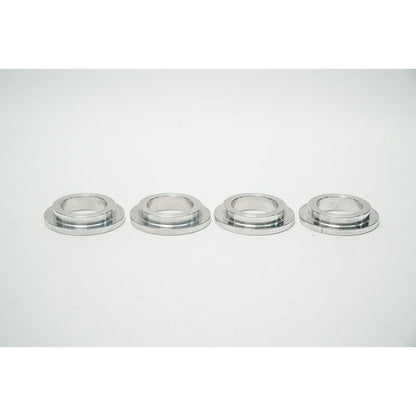 Coil spring adapters and ride height adjusters