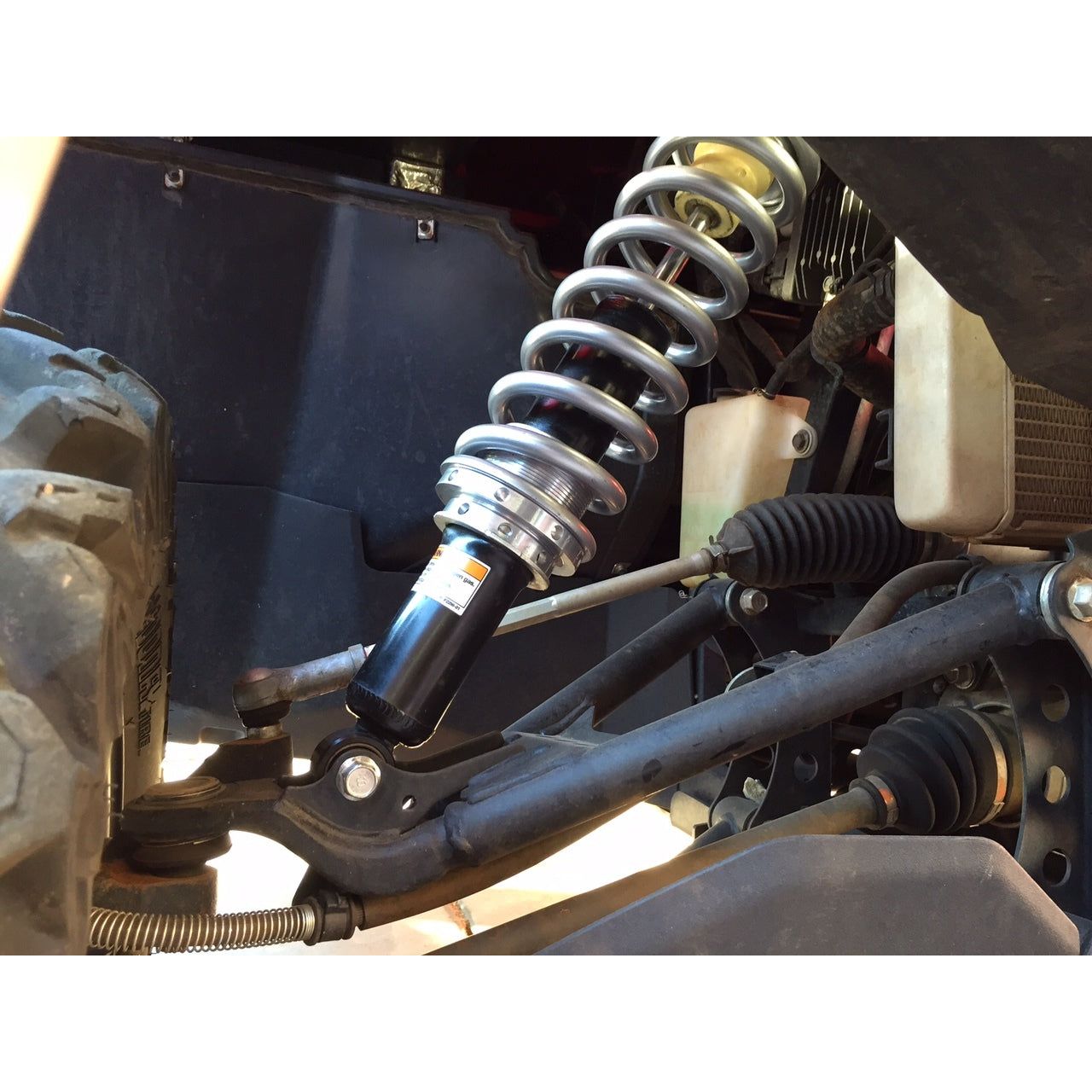 Front spring kit with pre load adjuster on the bottom of the spring