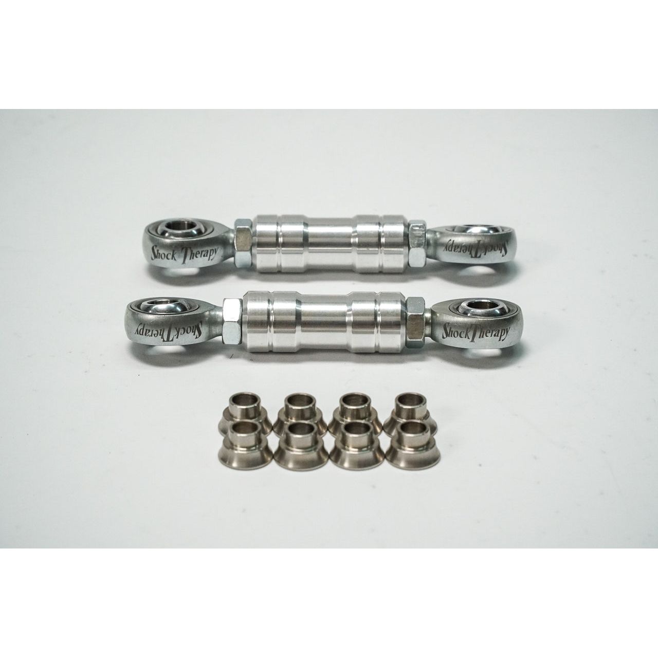 Billet aluminum links with stainless steel spacers